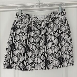 Frame denim mini skirt.  100% cotton with snake print pattern .  Size 29